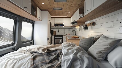 Fototapeta premium Scandinavian-inspired camper van interior, highlighting a cozy bed and kitchen room, ideal for vacation and camping trips