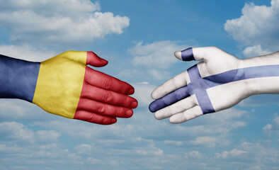 Finland and Chad country handshaking with flags, consensus concept international co-operation illustration