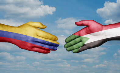 Sudan and Colombia country handshaking with flags, consensus concept international co-operation illustration