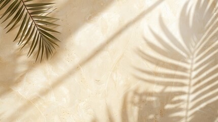 Beige marble background with palm leaf shadow, top view. Natural material in sunshine. Summer neutral tone.