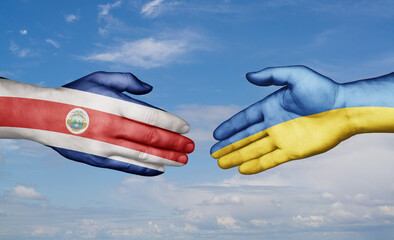 Ukraine and Costa Rico country handshaking with flags, consensus concept international co-operation illustration