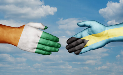 Bahamas and Ivory Coast country handshaking with flags, consensus concept international co-operation illustration