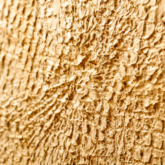 Gold patterned structured background. Golden structural patterns on a golden wall background.