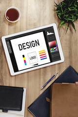 Graphic designer software for modern design of web page and commercial ads showing on the computer...