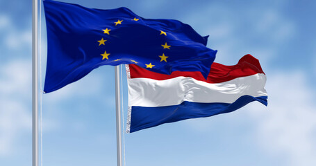 Flags of the Netherlands and the European Union waving