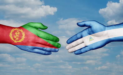 Nicaragua and Eritrea country handshaking with flags, consensus concept international co-operation illustration