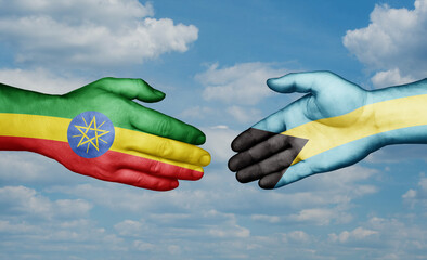 Bahamas and Ethiopia country handshaking with flags, consensus concept international co-operation illustration