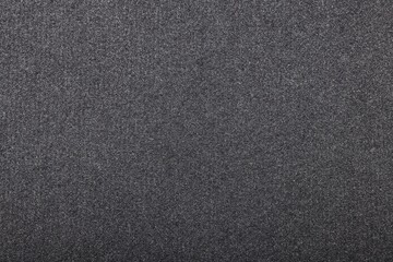 Black car mat as background, closeup view