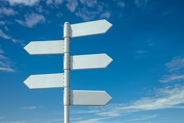 Image of five blank white road signs pointing in different directions against a bright blue sky with scattered clouds.