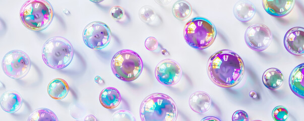 An array of iridescent bubbles of varying sizes scattered randomly on a clean white background, each bubble catching the light differently.