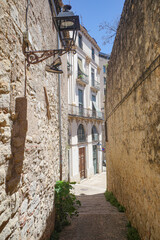 Girona, Spain - 23 July, 2024: Backstreets of the Jewish Quarter in Old Town Girona, Catalonia