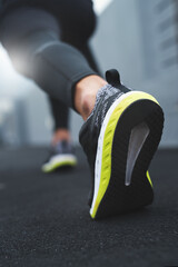 Start, runner and person with training, shoes and workout with race, sportswear and endurance. Closeup, sole and athlete with sneaker, beginning marathon and cardio with challenge, balance or fitness