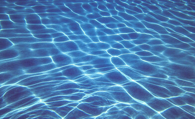 Under water in a blue pool