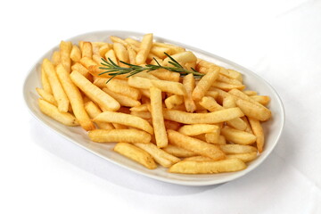 French fries in bowl seen from above on white background