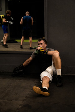 man after boxing training in the gym.