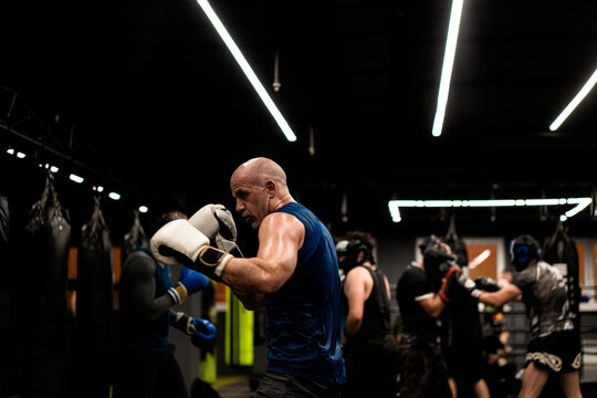 Boxers fighting in boxing training in the gym.