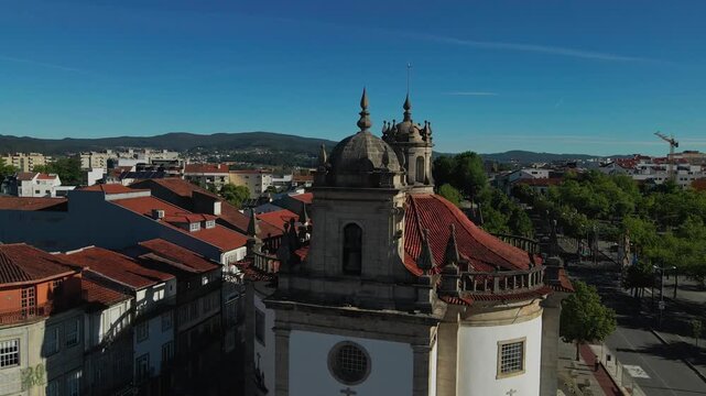 Aerial close-up of Senhor da Cruz Church in Barcelos, Portugal against a clear sky