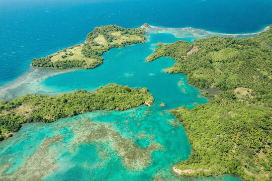 Exotic natural beauty of the Molucca Sea and lush vegetation at Borgo Satu in North Sulawesi, Indonesia; Borgo Satu, Belang, Southeast Minahasa Regency, North Sulawesi, Indonesia