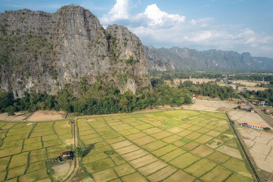 Limestone karst and rice fields in a valley near Kong Lor Cave in Laos; Khammouane Province, Laos