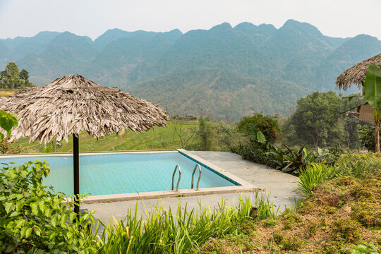 Swimming pool with a view of the mountainous landscape in Thanh Hoa, Vietnam; Pu Luong, Thanh Lam, Ba Thuoc, Thanh Hoa, Vietnam