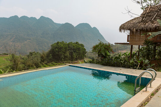 Outdoor pool with a view of the mountainous landscape in Thanh Hoa, Vietnam; Pu Luong, Thanh Lam, Ba Thuoc, Thanh Hoa, Vietnam