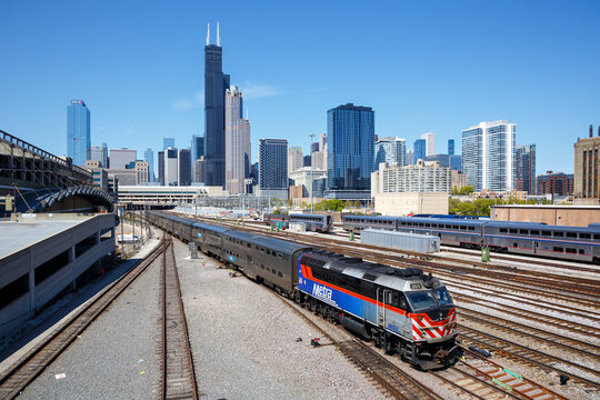 Chicago Skyline with METRA commuter train public transport at Union Station in Chicago, United States