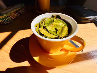 Coca tea for elevation sickness at a cafe in Cusco, Peru.