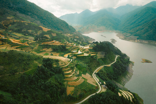 Mountainous landscape with farmland and water in Nam Pam in Vietnam; Nam Pam, Muong La District, Son La, Vietnam