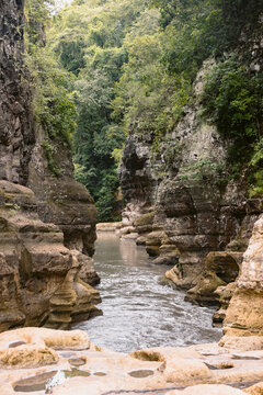 Tranquil river and vegetation at Air Terjun Tanggedu, Indonesia; Ndapayami, Kanatang, East Sumba Regency, East Nusa Tenggara, Indonesia