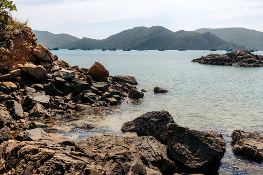 Boats moored in an inlet in the Con Dao archipelago, South China Sea, Vietnam; Tai Sinh Zone, Ben Dam, Con Dao, Ba Rịa-Vung Tau, Vietnam