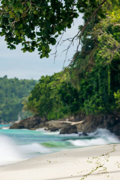 Beautiful white sand beach beach named Pantai Kelapa Lima (5 coconuts) along the coast of Central Sulawesi, Indonesia; Kelapa Lima, Banggai Laut, Central Sulawesi, Indonesia