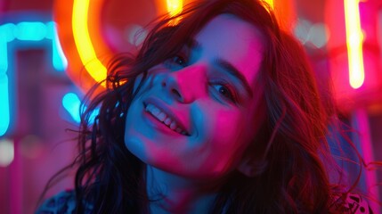 Obraz premium Woman Smiling Under Neon Lights