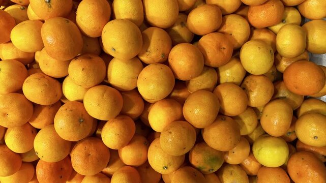 Orange fruit with top shot pattern, background pan shot, food, fresh and natural, organic and bio
