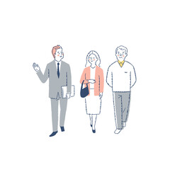 シニアカップルを案内するビジネスマン