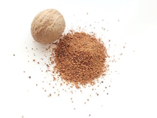 Appetizing pile of raw nutmeg.