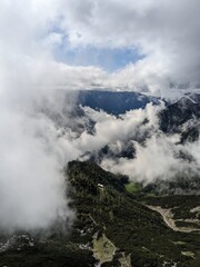 Wide panoramic view of Grosser Priel mountain peak in the Austrian Alps surrounded by rocky ridges and alpine nature.

