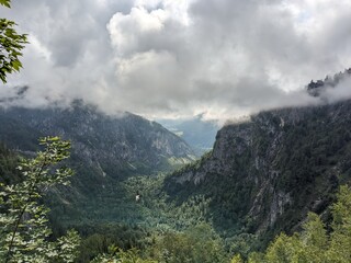View of Krummer Steyr river valley seen from Grosser Priel mountain in Hinterstoder Austria surrounded by alpine ridges.

