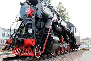 Obraz premium The retro train stands on the rails.