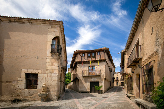 Charming corner on Calle Real in the medieval town of Pedraza, Segovia, Castilla y Le&oacute;n, Spain, with its historic houses and palaces and cobbled streets