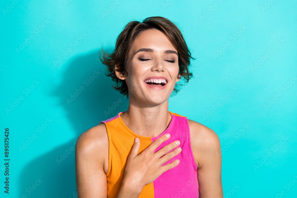 Sticker Photo of funny cheerful lady dressed colorful top closed eyes laughing empty space isolated turquoise color background