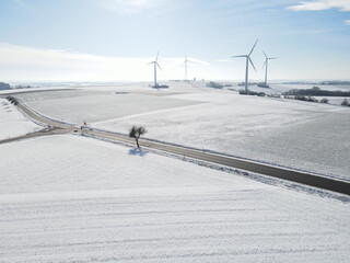 Aerial view of a landscape with snow in winter