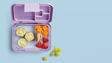 Closeup of small bento lunchbox isolated on copy-space background.