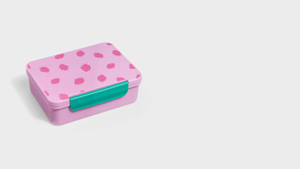 Closeup of small bento lunchbox isolated on copy-space background.