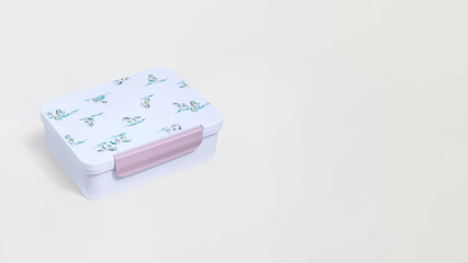 Closeup of small bento lunchbox isolated on copy-space background.
