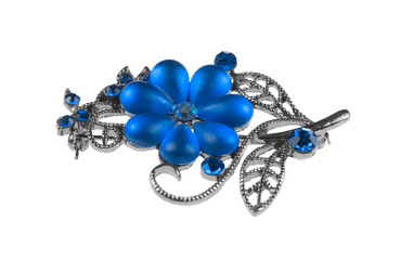 vintage brooch with blue stones isolated on white background
