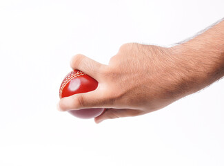 Closeup Photo Of A Male Bowler Strong Grip On A Gleaming Red Test Cricket Ball On White Background