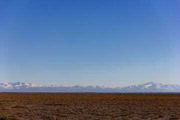 Wide Panoramic of Patagonian Steppe with Snow-capped Andes