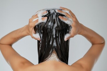 Woman Washing Her Hair With Shampoo