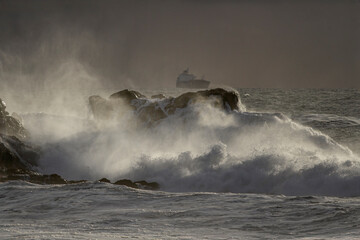 Wave splash at sunset
