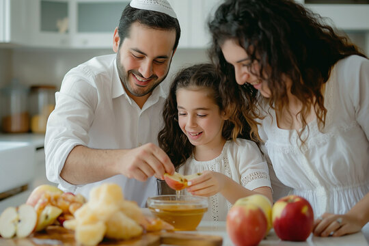 Jewish family celebrating Rosh Hashanah. Parents and daughter at a table with honey and apples, representing the Jewish New Year traditions